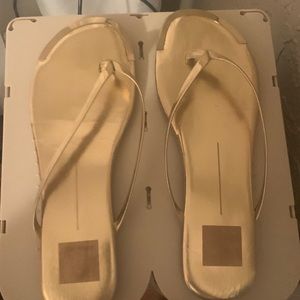 Gold flip flops